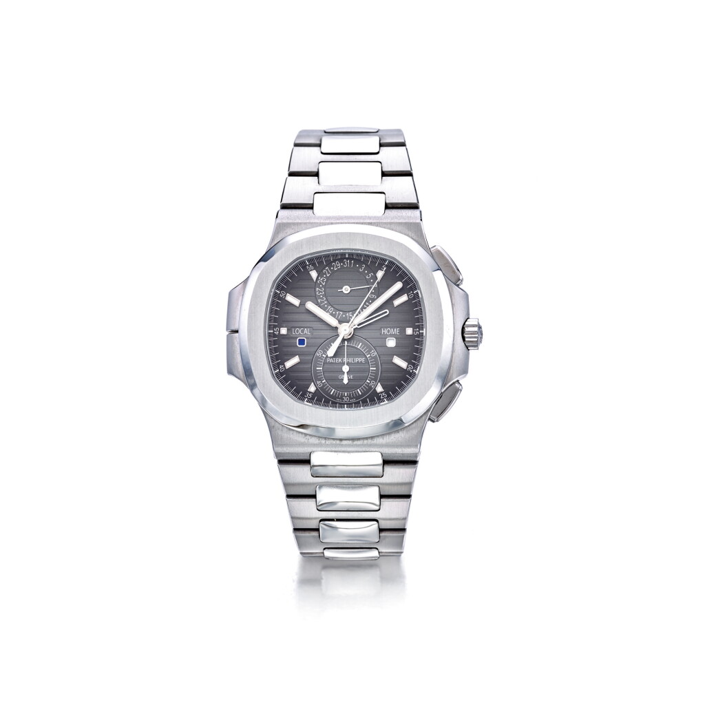 View full screen - View 1 of Lot 956. PATEK PHILIPPE | REF 5990/1A NAUTILUS, A STAINLESS STEEL DUAL TIME FLYBACK CHRONOGRAPH WRISTWATCH WITH DATE AND BRACELET CIRCA 2017 | 百達翡麗 | 5990/1A型號「NAUTILUS」精鋼兩地時間飛返計時鍊帶腕錶備日期顯示,年份約2017.