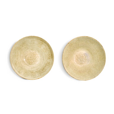View full screen - View 1 of Lot 397. A pair of moulded Qingbai 'phoenix' bowls, Song dynasty | 宋 青白釉印穿花鳳紋盌一對.