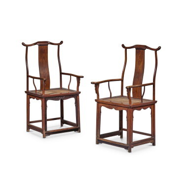 View full screen - View 1 of Lot 136. A pair of 'huanghuali' yokeback armchairs (Sichutouguanmaoyi), 17th / 18th century | 十七 / 十八世紀 黃花梨四出頭官帽椅一對.
