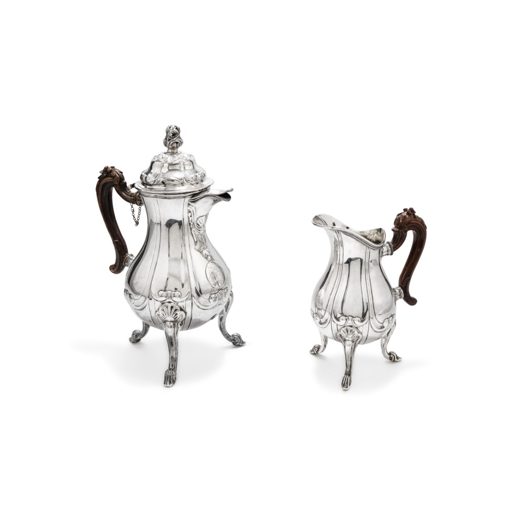 View full screen - View 1 of Lot 102. A silver chocolate-pot, maker's mark a pear, Mons, 1767, with a silver cream pot in the same style, Ghent, 1814-1831 marker's mark DP in a hexagon | Chocolatière en argent, orfèvre une poire, Mons, 1767, avec un pot à crème en argent de même style rapporté, orfèvre DP dans un hexagone, Gand, 1814-1831.