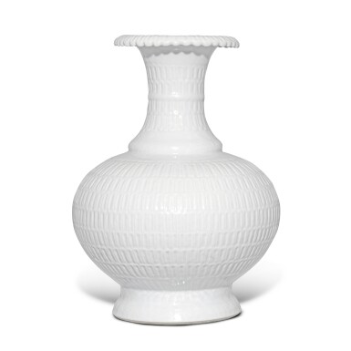 View full screen - View 1 of Lot 160. A rare molded white-glazed vase, Qing dynasty, 18th / 19th century.