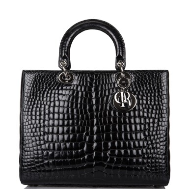 View full screen - View 1 of Lot 105. CHRISTIAN DIOR | BLACK SHINY NILOTICUS CROCODILE LARGE LADY DIOR BAG WITH RUTHENIUM HARDWARE.