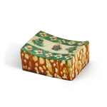 A sancai 'floral' pillow, Tang dynasty | 唐 三彩花卉紋枕