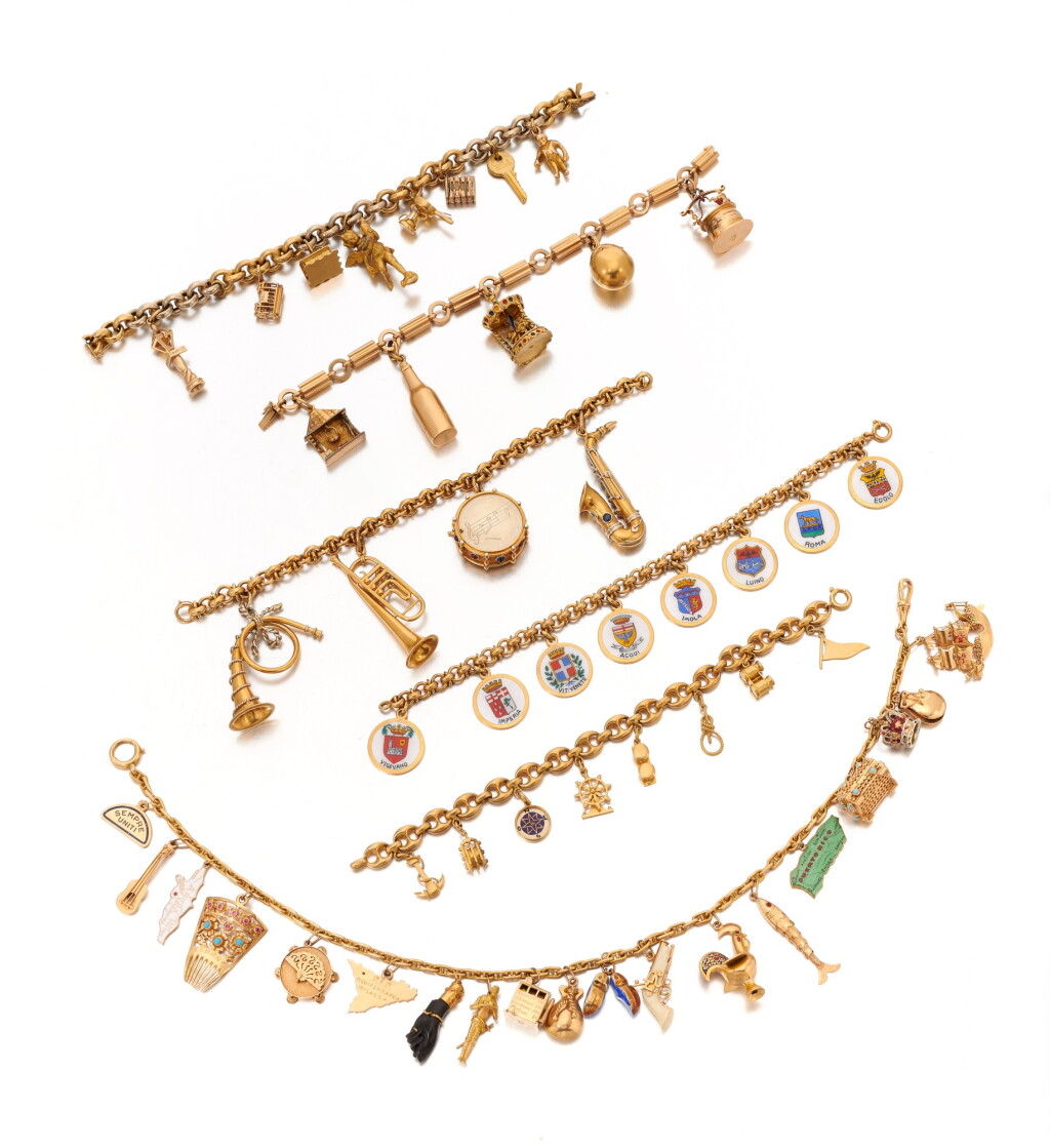View full screen - View 1 of Lot 55. Collection of charm bracelets and a necklace (Collezione di bracciali con pendenti ed una collana).