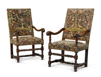 View full screen - View 1 of Lot 28. A pair of Louis XIV carved walnut fauteuils, second half 17th century.