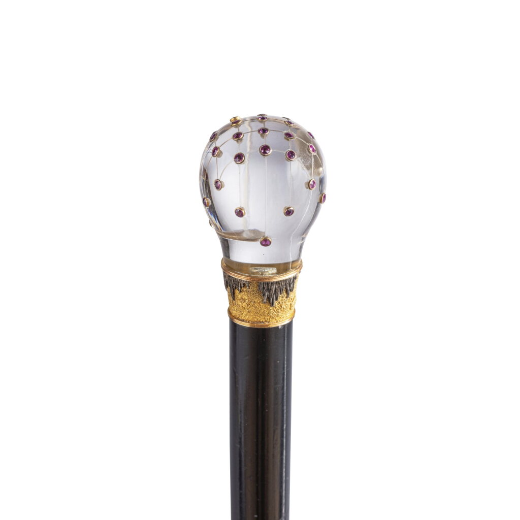 View full screen - View 1 of Lot 731. A gem-set gold-mounted rock crystal cane handle, late 19th/early 20th century.