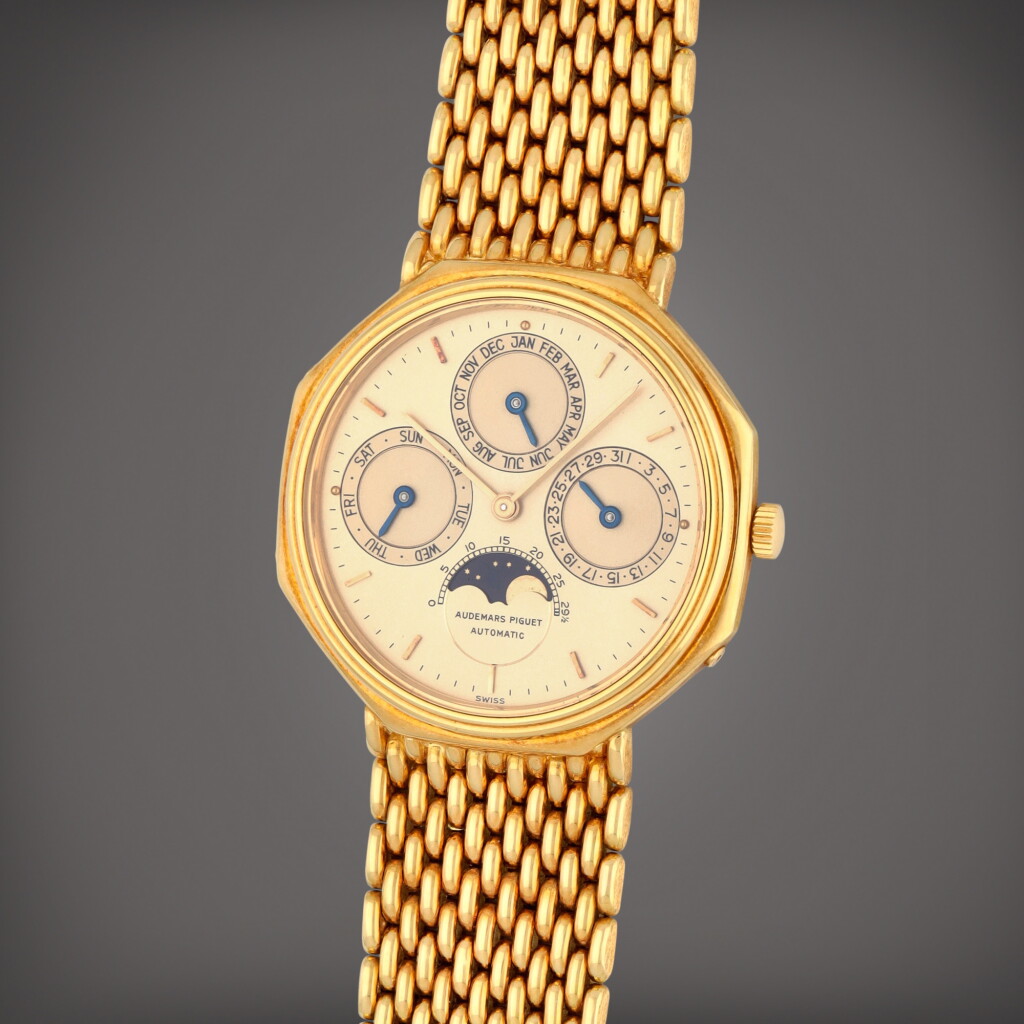 View full screen - View 1 of Lot 70. Reference 25557BA | A yellow gold perpetual calendar bracelet watch with moon phases | Circa 1981.
