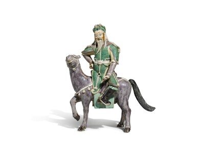 View full screen - View 1 of Lot 48. An enamel on biscuit equestrian group, Qing dynasty, Kangxi period | 清康熙 素三彩關帝騎馬像.