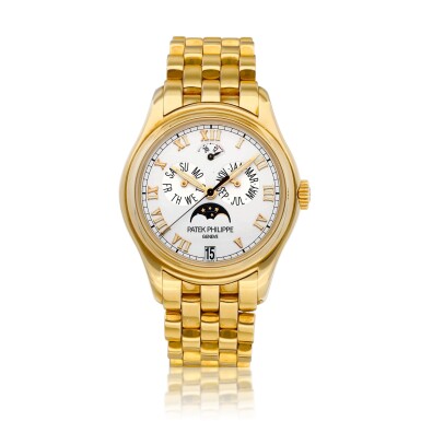 View full screen - View 1 of Lot 2312. Reference 5036 | A yellow gold annual calendar wristwatch with day, date, moon phases, power reserve indication and bracelet, Circa 2000 | 百達翡麗 | 型號5036 | 黃金年曆鏈帶腕錶,備日期、星期、月相及動力儲備顯示,約2000年製.