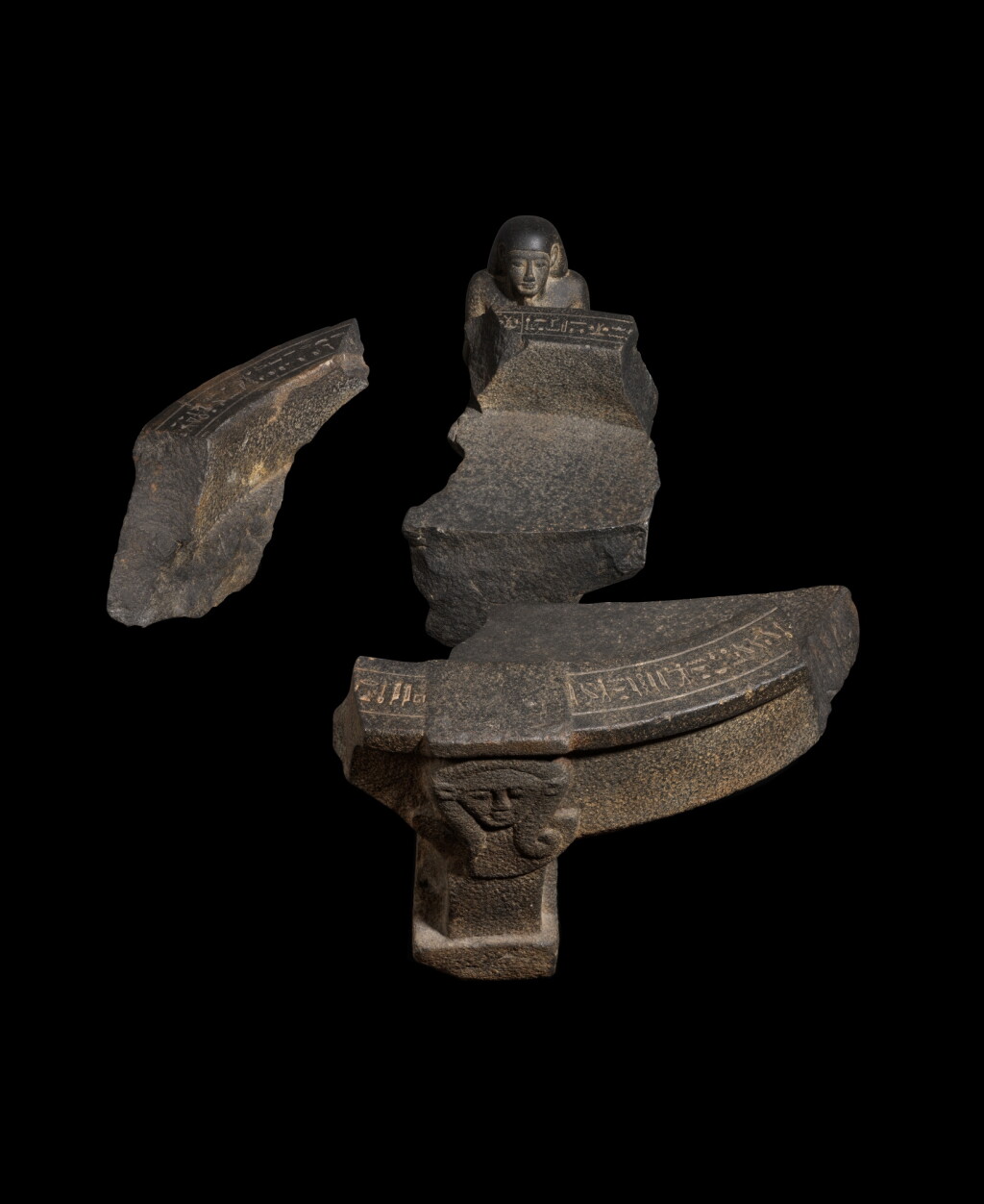 View full screen - View 1 of Lot 32. An Egyptian Basalt Basin-bearing Figure of the Customs Chief Wahibre, Reign of Amasis, 570-526 B.C..