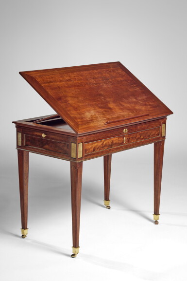 View full screen - View 1 of Lot 200. A Louis XVI Gilt Brass Mounted Mahogany and Ebony Table à la Tronchin by Jean-Henri Riesener, Circa 1785.