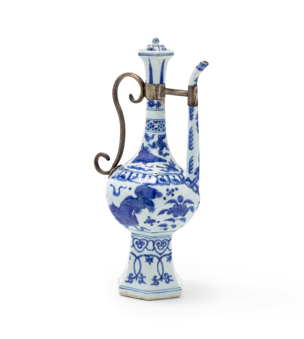 View full screen - View 1 of Lot 24. A blue and white ewer and cover Ming dynasty, 16th century | 明十六世紀 青花佛獅紋六方執壺.