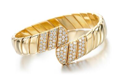 View full screen - View 1 of Lot 41. DIAMOND BANGLE, ATTRIBUTED TO CARTIER.