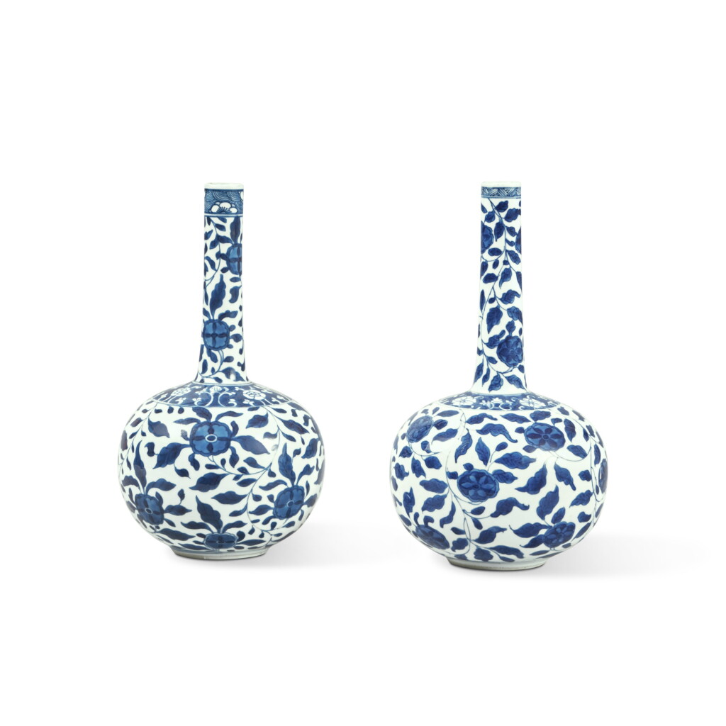View full screen - View 1 of Lot 745. A Pair of Chinese Blue and White 'Floral' Bottle Vases, Qing Dynasty, Kangxi Period.