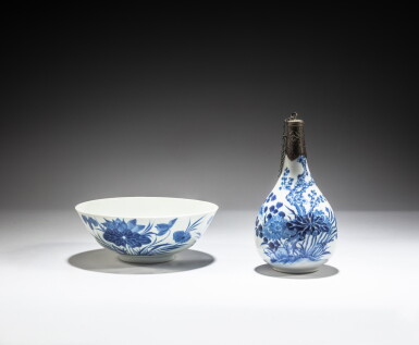 View full screen - View 1 of Lot 123. A blue and white 'lotus and crab' bowl and a 'lotus and prunus' bottle vase, China for the Vietnamese court, 19th / 20th century | 中國外銷安南 十九 / 二十世紀 青花蓮及蟹紋盌及青花蓮紋賞瓶一組兩件.