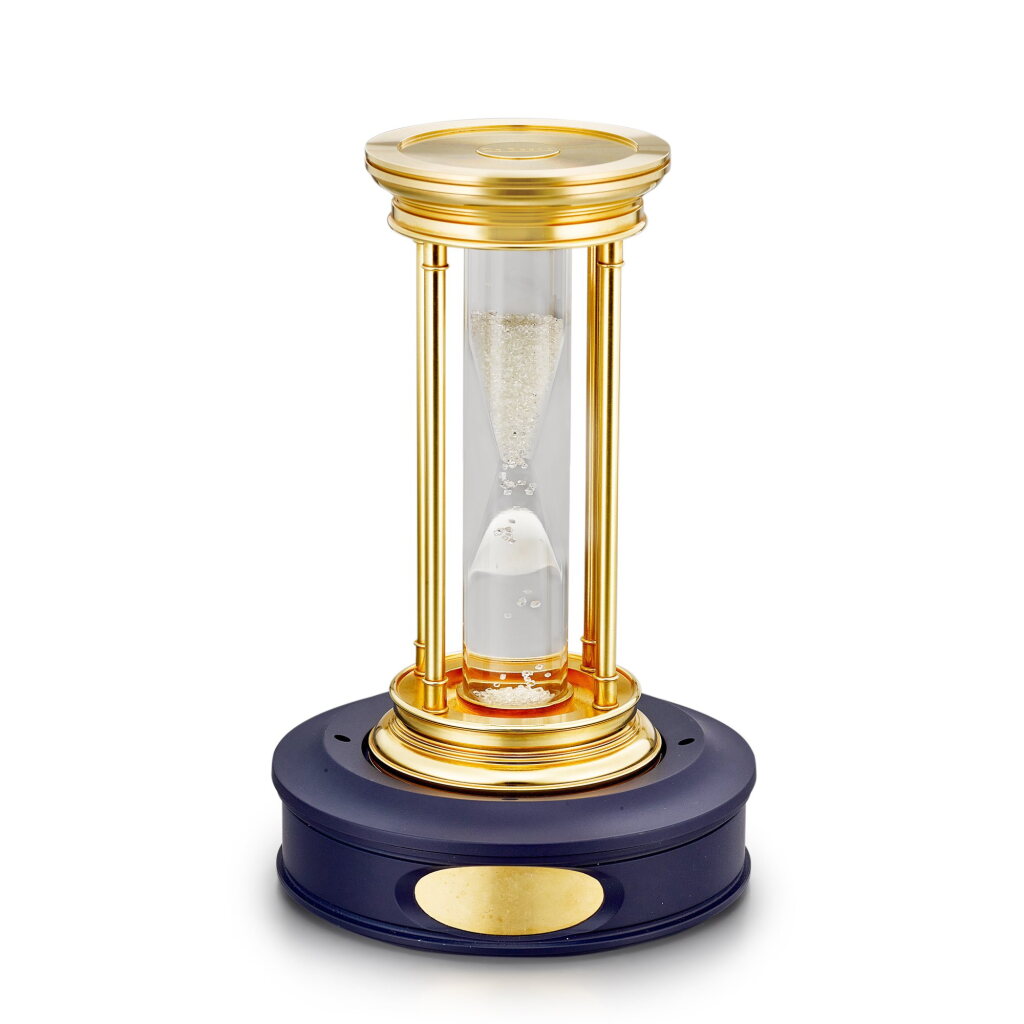 View full screen - View 1 of Lot 8165. A gilt brass hourglass with floating diamonds, Circa 2000 | 鍍金銅製沙漏,備浮動鑽石,約2000年製.