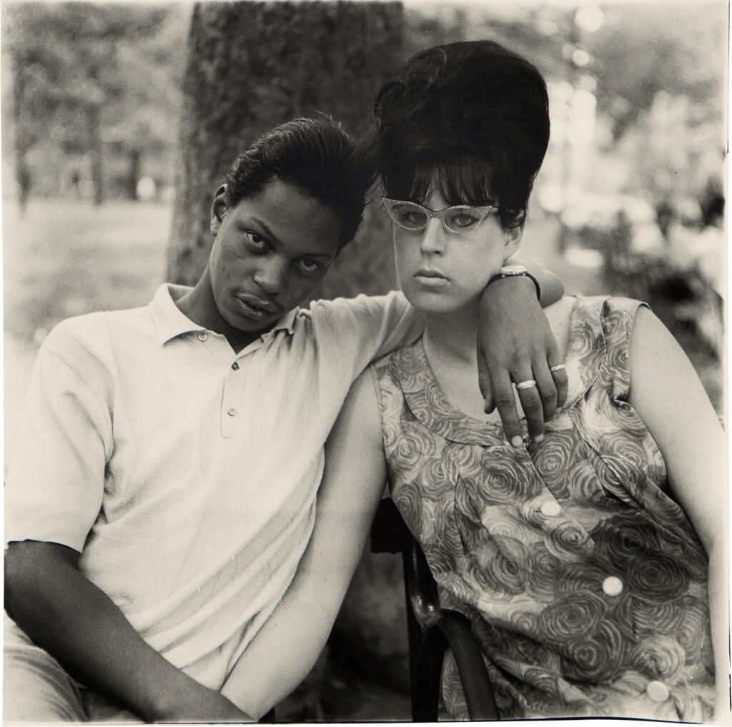 View full screen - View 1 of Lot 147. A young man and his pregnant wife in Washington Square Park, NYC.
