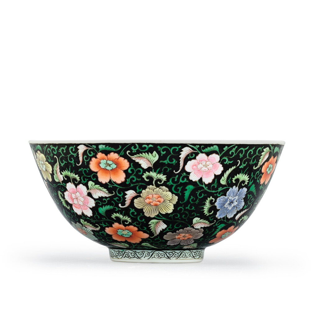 View full screen - View 1 of Lot 366. A rare black-ground famille-rose bowl Mark and period of Yongzheng | 清雍正 黑地粉彩纏枝花卉紋盌 《大清雍正年製》款.