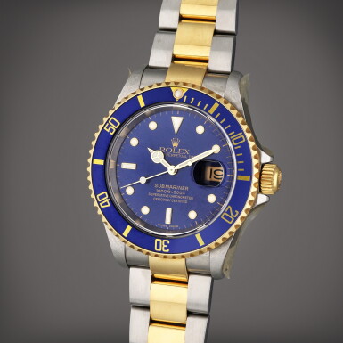 View full screen - View 1 of Lot 435. Reference 16613 Submariner | A yellow gold and stainless steel automatic wristwatch with date and bracelet, Circa 2002.