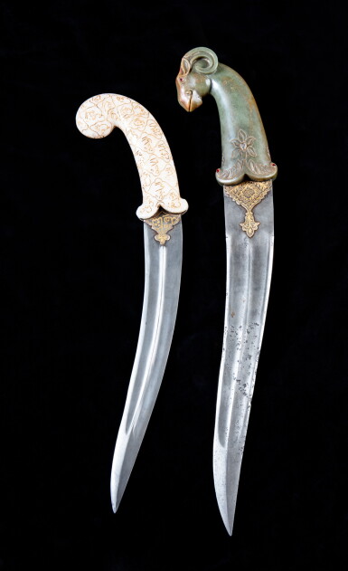 View full screen - View 1 of Lot 234. A jade and an agate hilted khandjar daggers, India, 19th-20th century | 印度十九至二十世紀 青玉雕羊首形柄匕首坎查劍 及 瑪瑙雕柄匕首坎查劍.