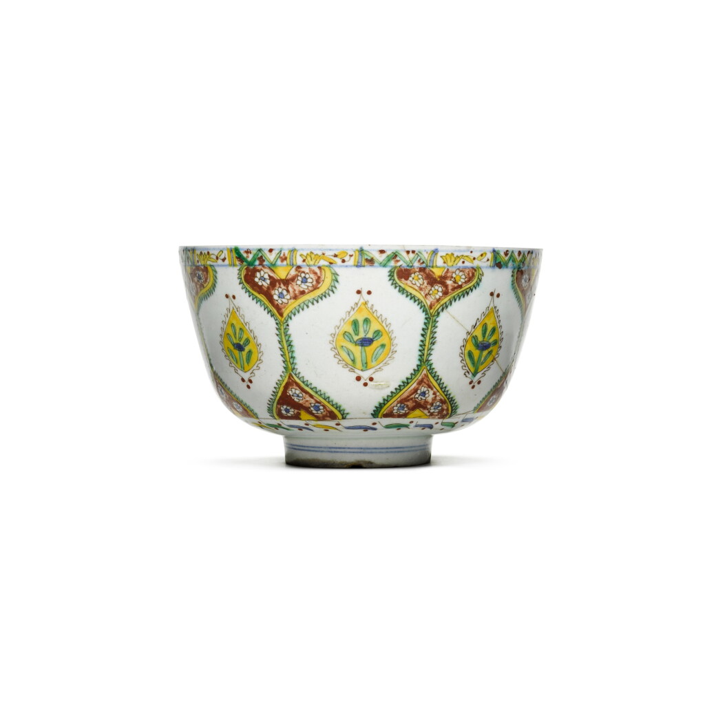 View full screen - View 1 of Lot 93. A large Kütahya polychrome pottery bowl with ogival designs, Turkey, 18th century.