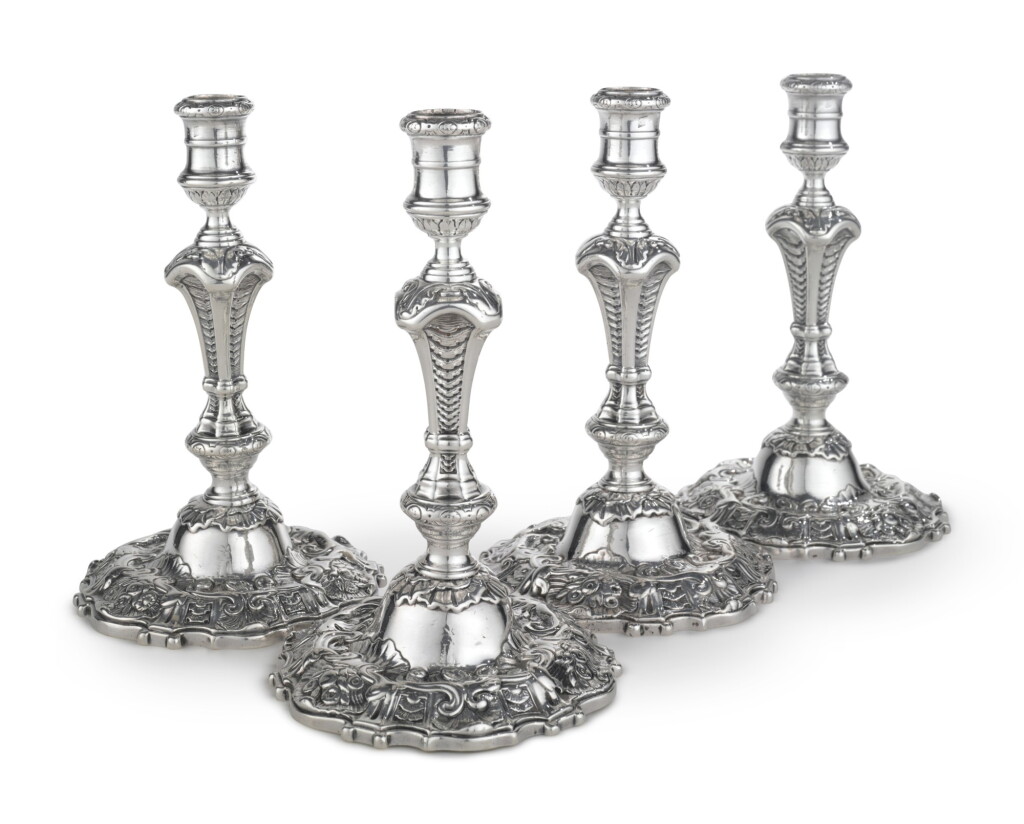 View full screen - View 1 of Lot 113. A Set of Four George II Silver Table Candlesticks, Eliza Godfrey, London, 1741.