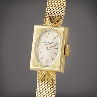 View full screen - View 1 of Lot 112. Reference 3256 | A yellow gold bracelet watch, Circa 1961.