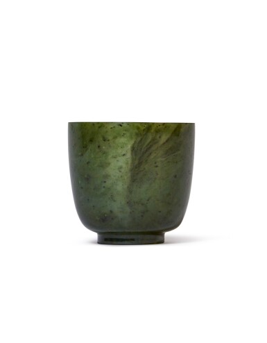 View full screen - View 1 of Lot 943. A spinach-green jade cup, Qing dynasty, 19th century | 清十九世紀 碧玉小盃.