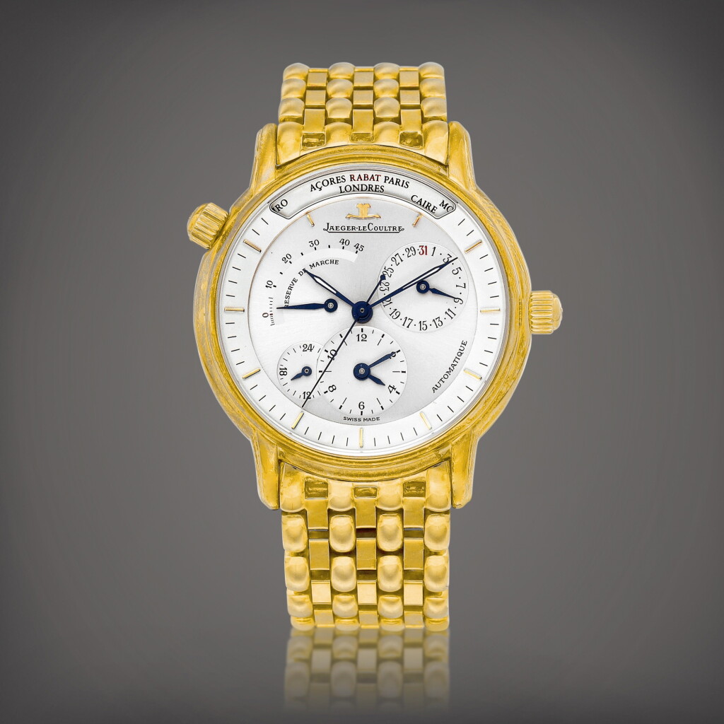 View full screen - View 1 of Lot 955. Geographique, Reference 169.1.92 | A yellow gold world time wristwatch with date, power reserve, 24 hour indication and associated bracelet, Circa 1996 | 積家 | Geographique 型號169.1.92 | 黃金世界時間腕錶,備日期、動力儲備、24小時顯示及後配鏈帶,約1996年製.