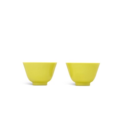View full screen - View 1 of Lot 39. A fine and rare pair of lemon-yellow-enameled cups, Marks and period of Yongzheng.