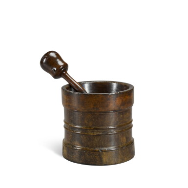 View full screen - View 1 of Lot 23. A large English boldly turned lignum vitae mortar and iron mounted pestle, 17th century.