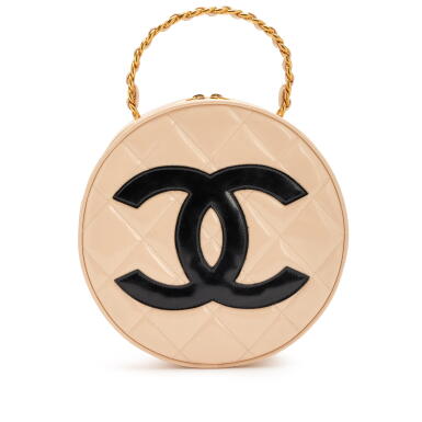 View full screen - View 1 of Lot 29. Vintage Beige and Black Patent Leather Round Vanity Bag Aged Gold Hardware, 1994-1996.