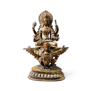 View full screen - View 1 of Lot 74. A gilt-bronze figure of Vishnu and Garuda Nepal, 16th century | 尼泊爾 十六世紀 鎏金銅毘濕奴與嘉魯達坐像.