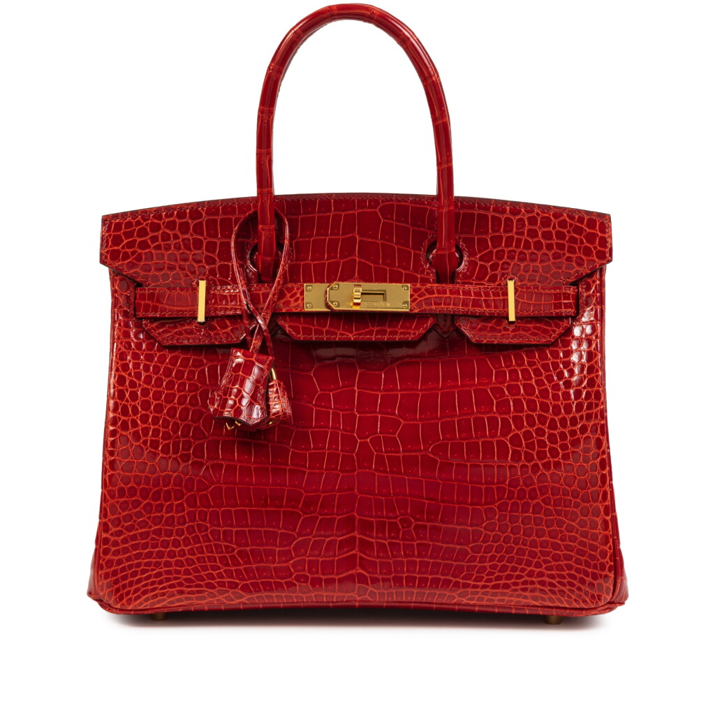 View full screen - View 1 of Lot 630. Sanguine Shiny Porosus Crocodile Birkin 30 Gold Harware, 2020.