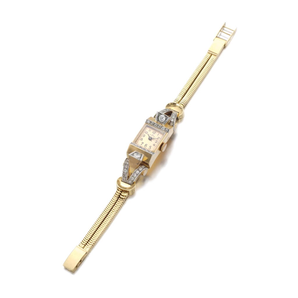View full screen - View 1 of Lot 131. LADY'S GOLD AND DIAMOND WRISTWATCH, OMEGA, 1940S.
