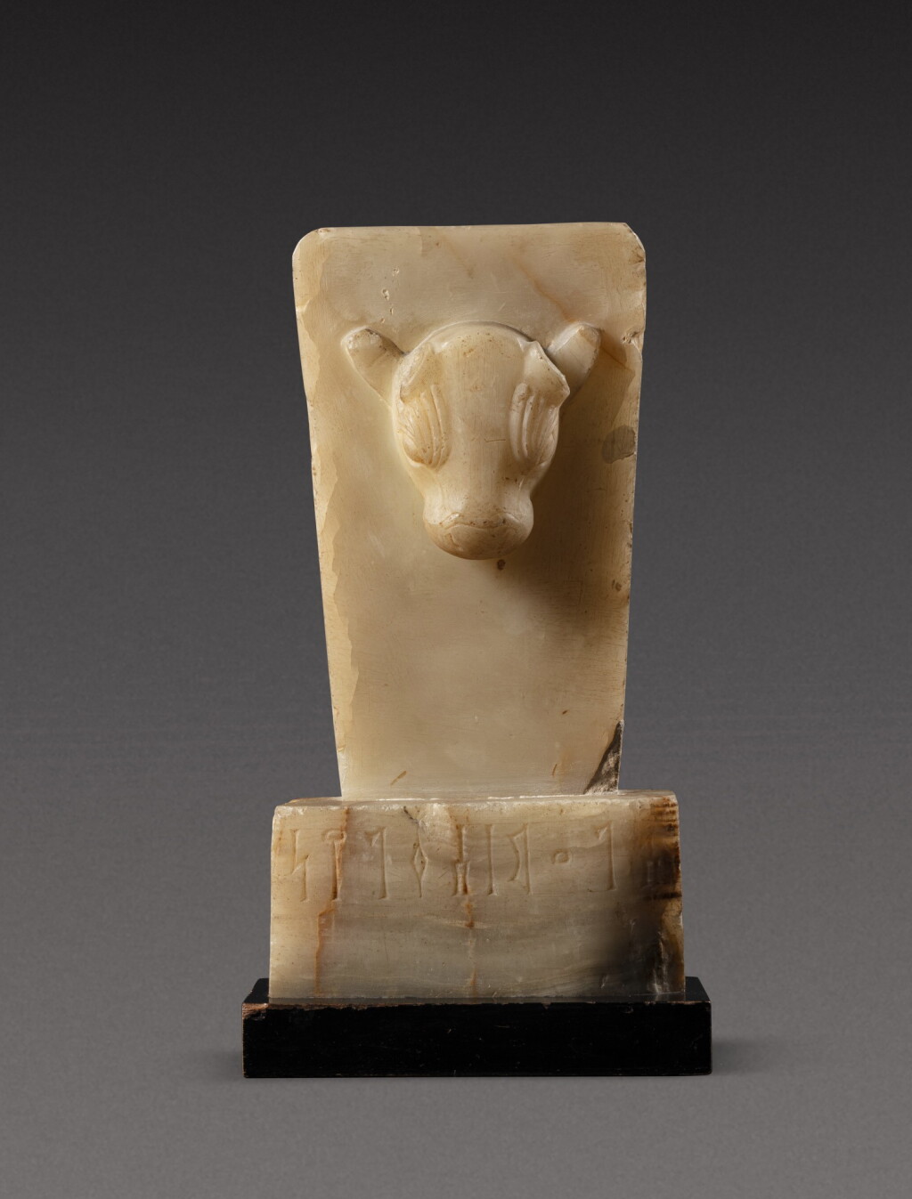 View full screen - View 1 of Lot 16. A South Arabian Alabaster Bull Stele, Qataban, 3rd Century B.C./1st Century A.D..