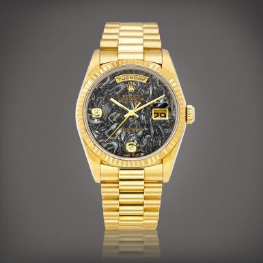 View full screen - View 1 of Lot 2234. Day-Date, Reference 18238 | A yellow gold and diamond-set wristwatch with day, date, ammonite dial and bracelet, Circa 1999 | 勞力士 | Day-Date 型號18238 | 黃金鑲鑽石鏈帶腕錶,備日期、星期顯示及菊石錶盤,約1999年製.