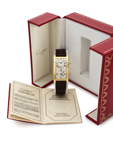 View full screen - View 1 of Lot 133. TANK CINTRÉE YELLOW GOLD RECTANGULAR WRISTWATCH WITH DUAL TIME-ZONE (OROLOGIO DA POLSO IN ORO GIALLO CON DOPPIO FUSO ORARIO) CIRCA 1990 | CARTIER, PARIS.