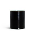 A black-glazed brushpot, Qing dynasty, Kangxi period 清康熙 烏金釉筆筒