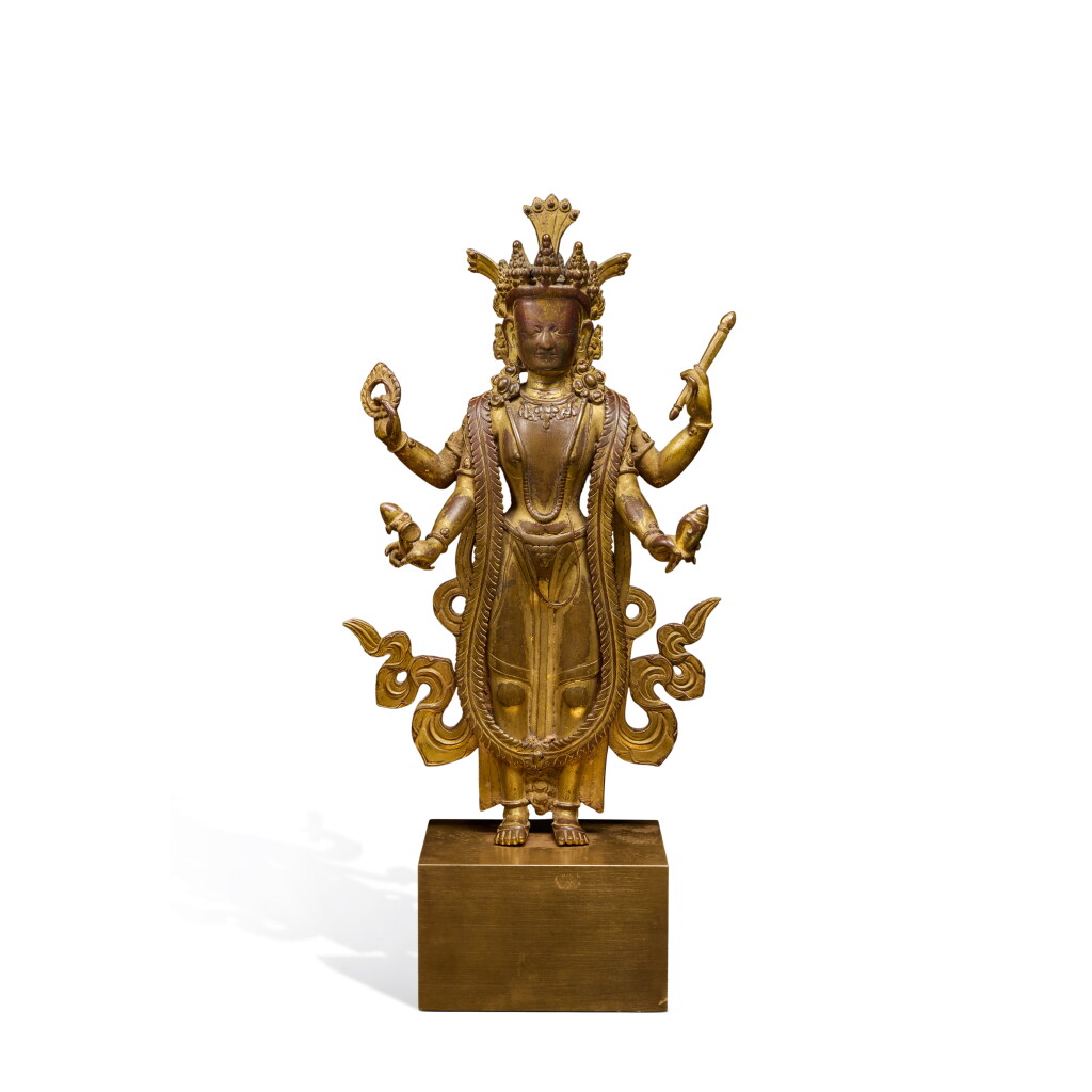 View full screen - View 1 of Lot 146. A gilt-copper alloy figure of Vishnu, Nepal, 18th / 19th century.
