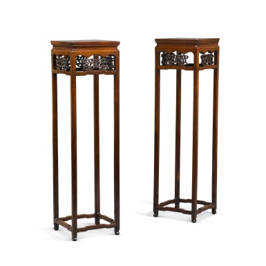View full screen - View 1 of Lot 561. A pair of tall square-topped hardwood vase stands, in the Qing style, 20th century.