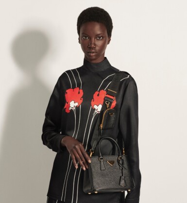 View full screen - View 1 of Lot 20. PRADA | SAFFIANO LEATHER HANDBAG. WORN BY ANOK YAI. ITEM NOT FEATURED IN THE SHOW.