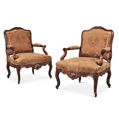 View full screen - View 1 of Lot 39. A Pair of Louis XV Carved Walnut Fauteuils à la Reine, Circa 1735.