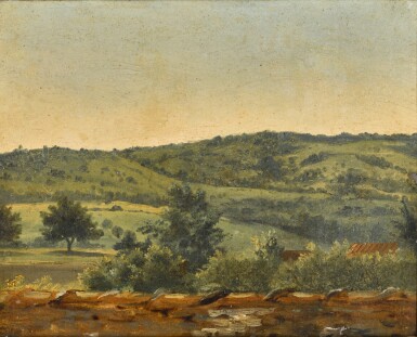View full screen - View 1 of Lot 75. Landscape with buildings visible beyond a wall and wooded hills.