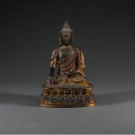 A GILT-LACQUERED BRONZE FIGURE OF SHAKYAMUNI, MING DYNASTY, 15TH/16TH CENTURY | 明十五/十六世紀 漆金銅釋迦牟尼佛坐像