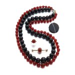 Onyx demi-parure and a collection of jewels