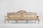 A George II Gray-Painted Oak Hall Settee in the manner of William Kent, Circa 1735