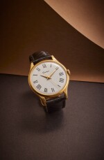 Grande Ronde | New York retailed: A yellow gold over-sized centre seconds wristwatch with yellow and pink gold deployant buckle, Circa 1955