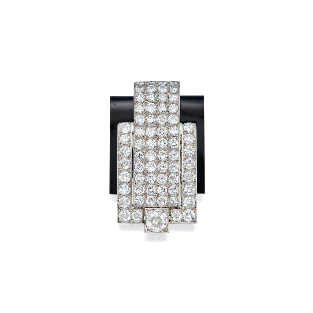 View full screen - View 1 of Lot 140. A Platinum, Diamond, and Onyx Clip-Brooch, Dusausoy, France.
