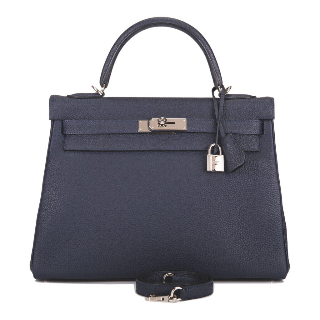 View full screen - View 1 of Lot 67. Hermès Bleu Nuit Retourne Kelly 28cm of Togo Leather with Palladium Hardware.